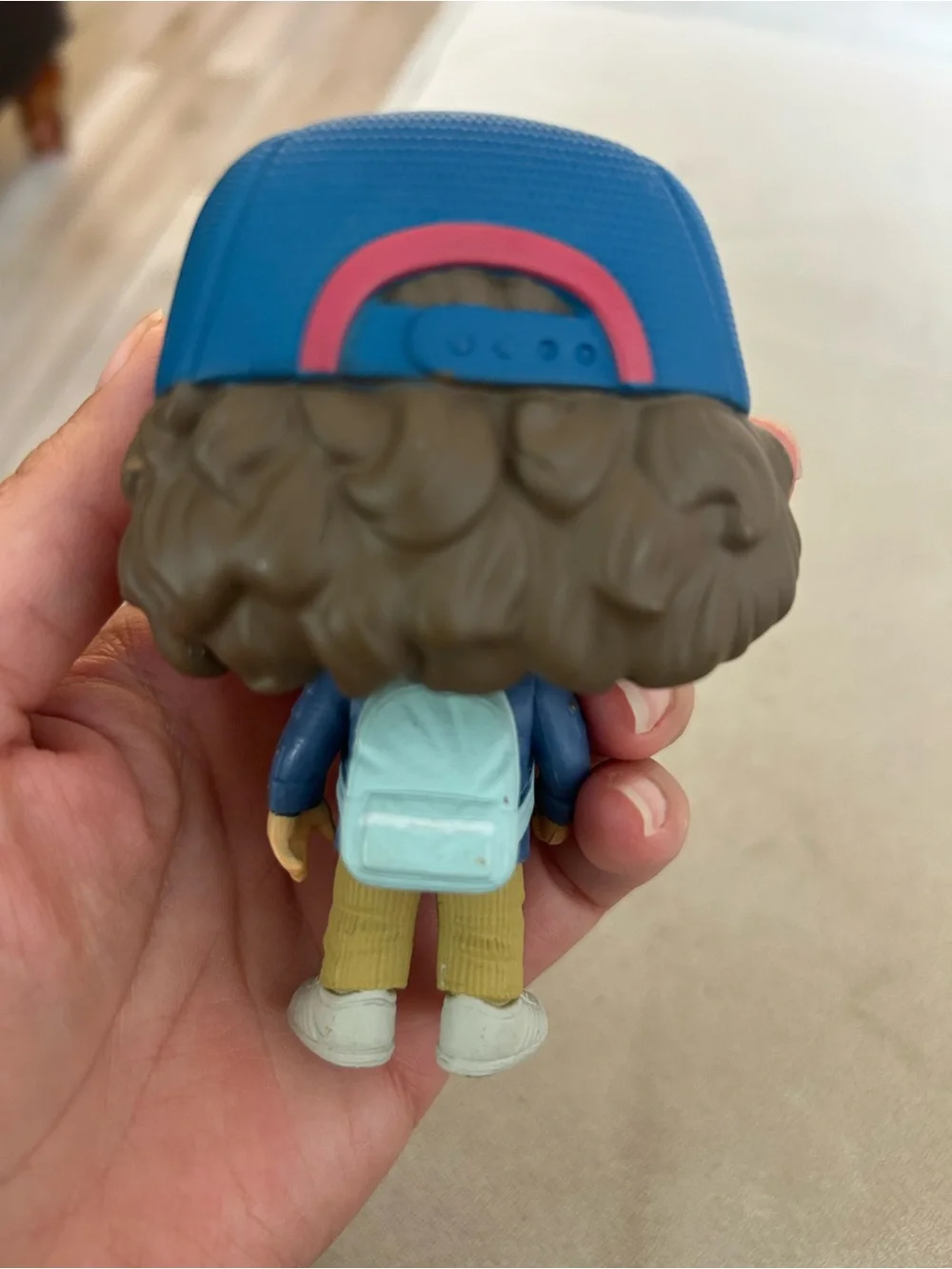 Funko Dustin Figure with White & Red Hat, Blue Jacket